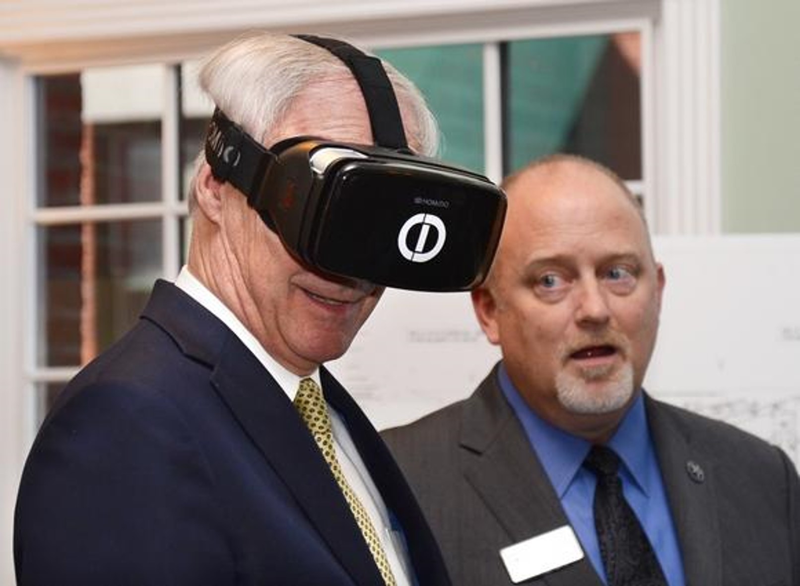 Gov. Asa Hutchinson wears a CDI VR Headset